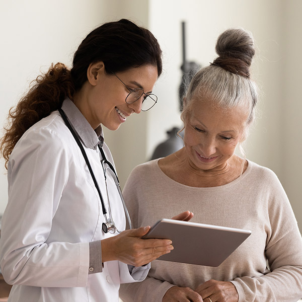 doctor consulting senior patient